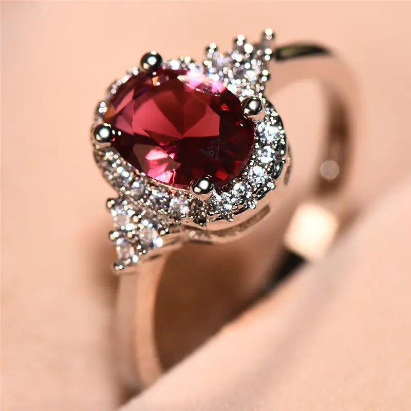 Bague halo en argent avec rubis