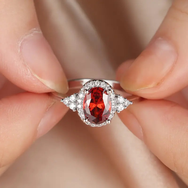 Bague halo en argent avec rubis