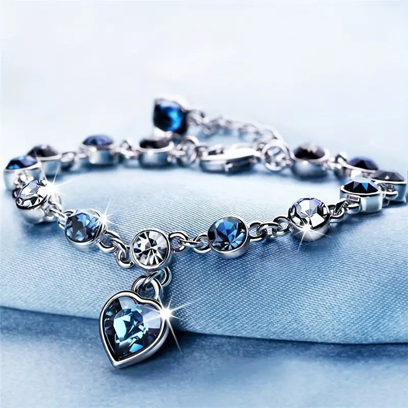 Bracelet chaîne en argent avec cœur en saphir