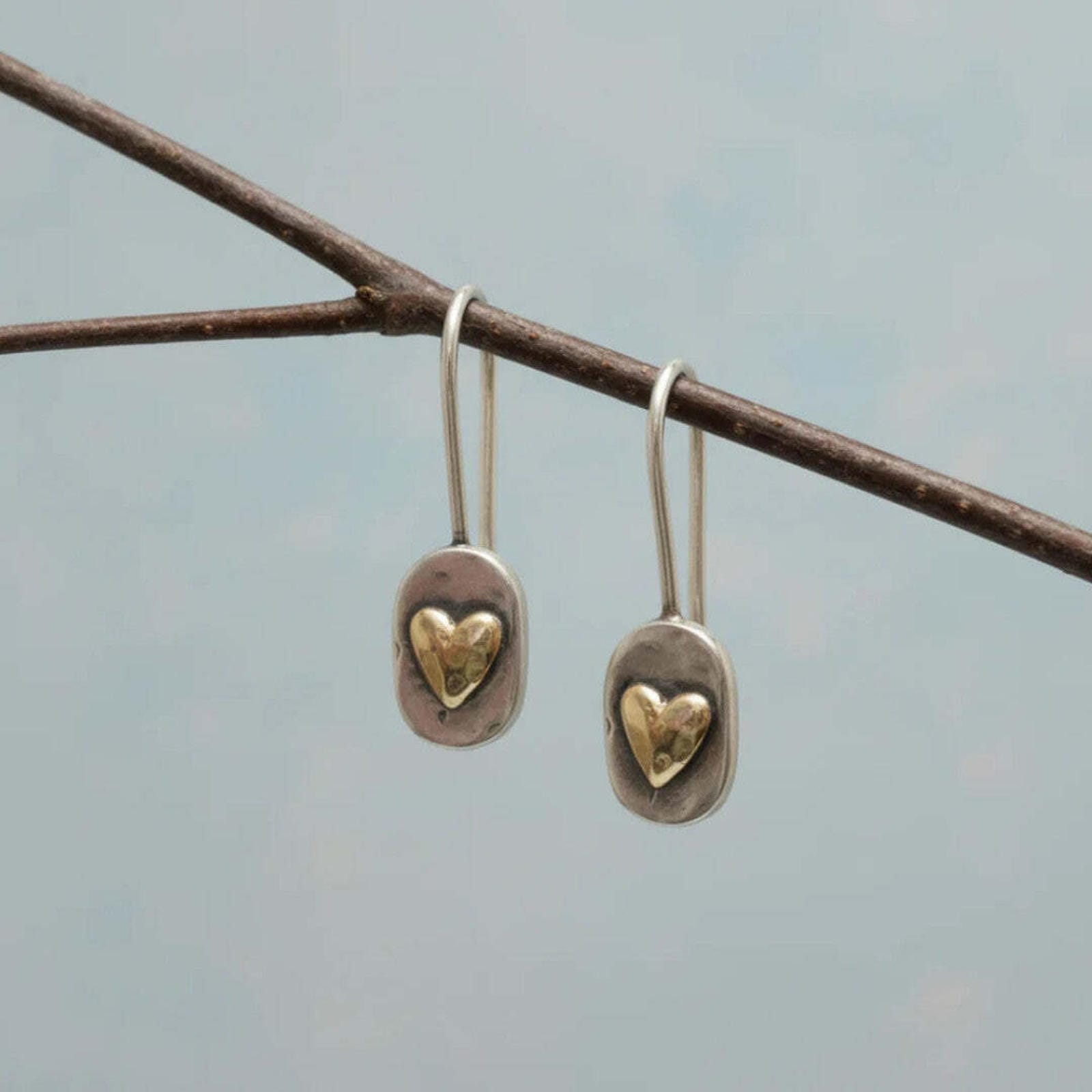 Boucles d’oreilles vintage dorées avec cœur incrusté