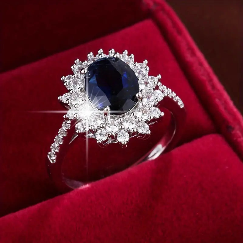 Bague halo en or avec saphir
