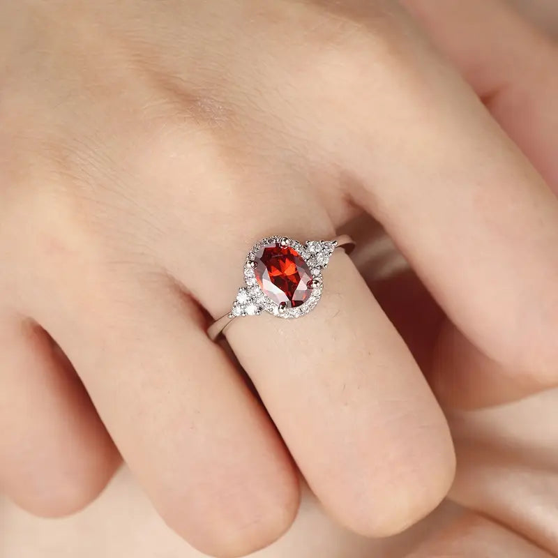 Bague halo en argent avec rubis