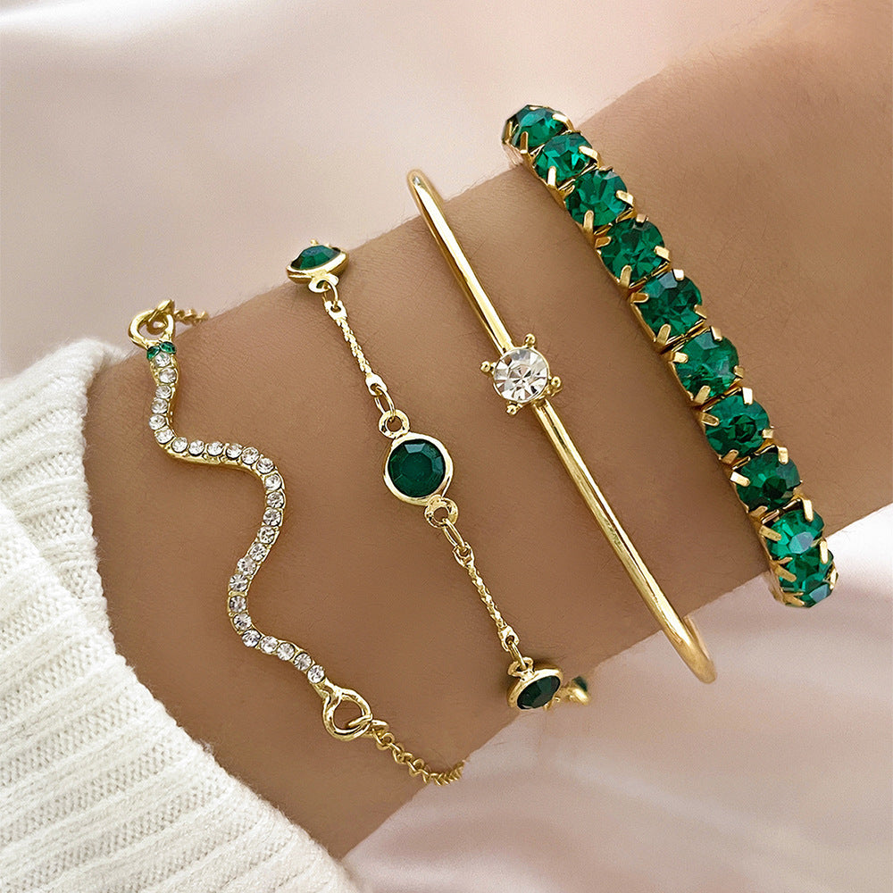 Ensemble de bracelets en or avec émeraude