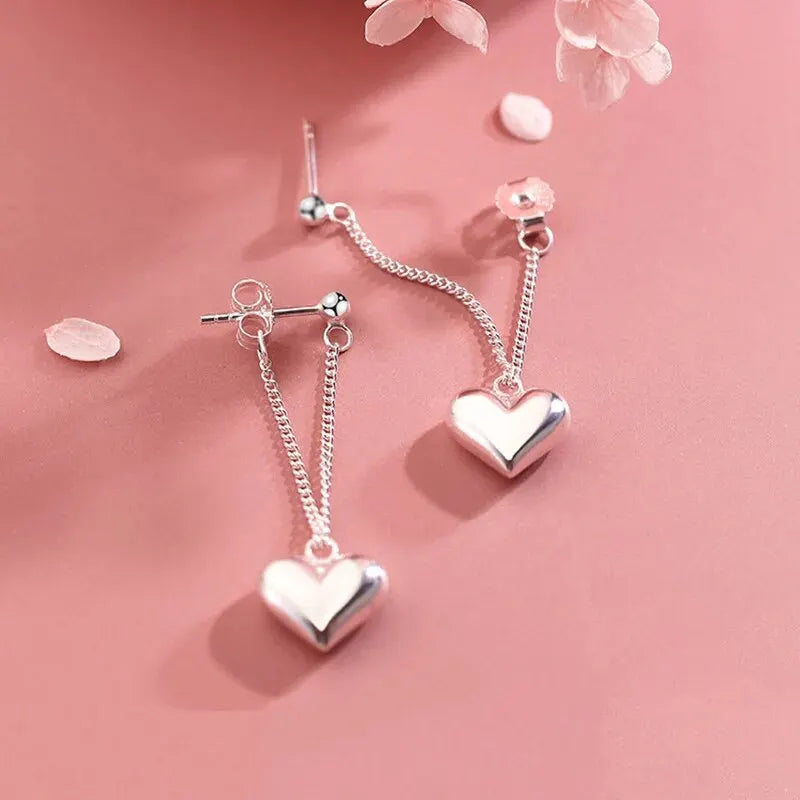 Boucles d’oreilles créoles géométriques en forme de cœur d’inspiration antique