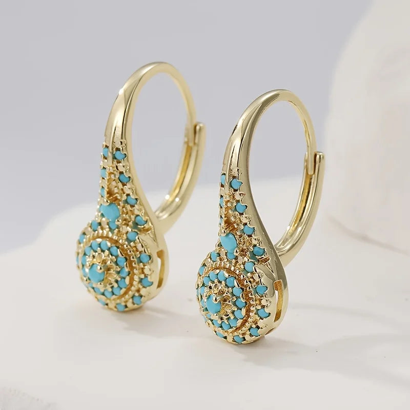Boucles d'oreilles fleur turquoise dorée