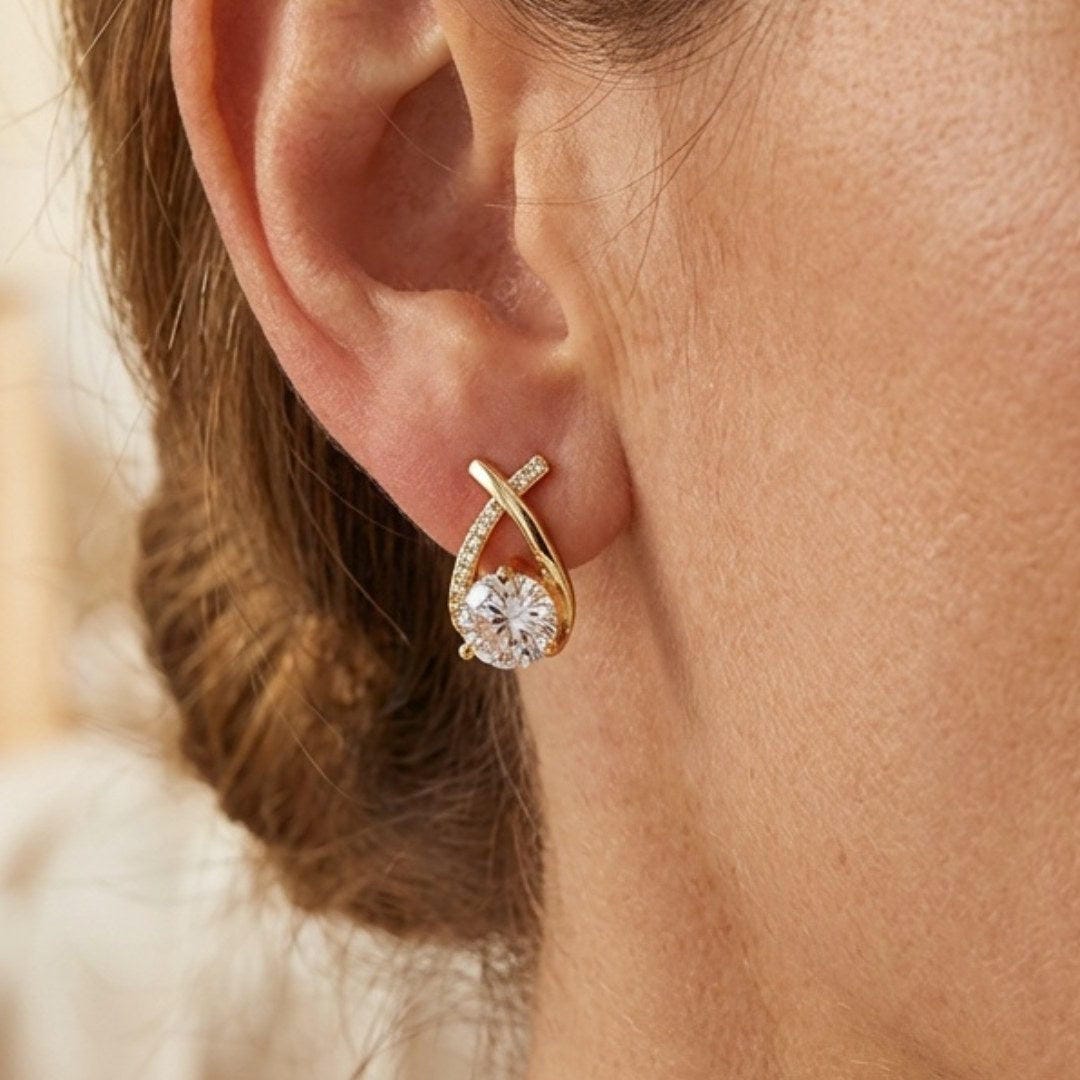 Boucles d’oreilles puces de luxe en forme de goutte torsadée avec zircone cubique