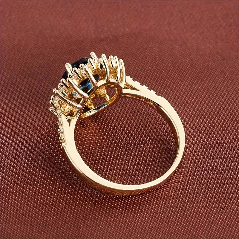 Bague halo en or avec saphir