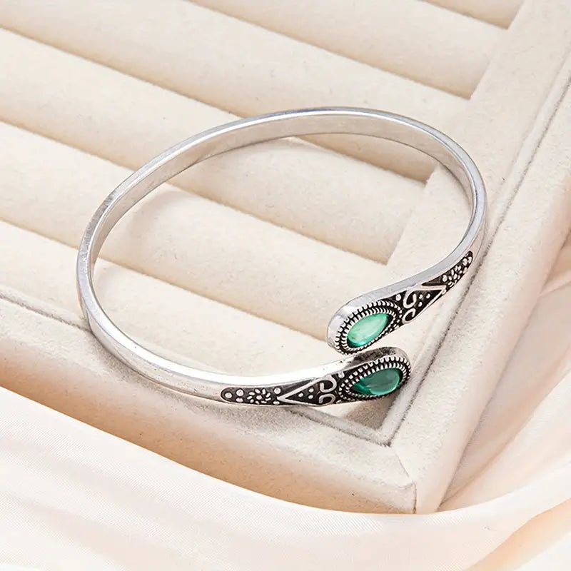 Bracelet jonc vintage en argent avec émeraude