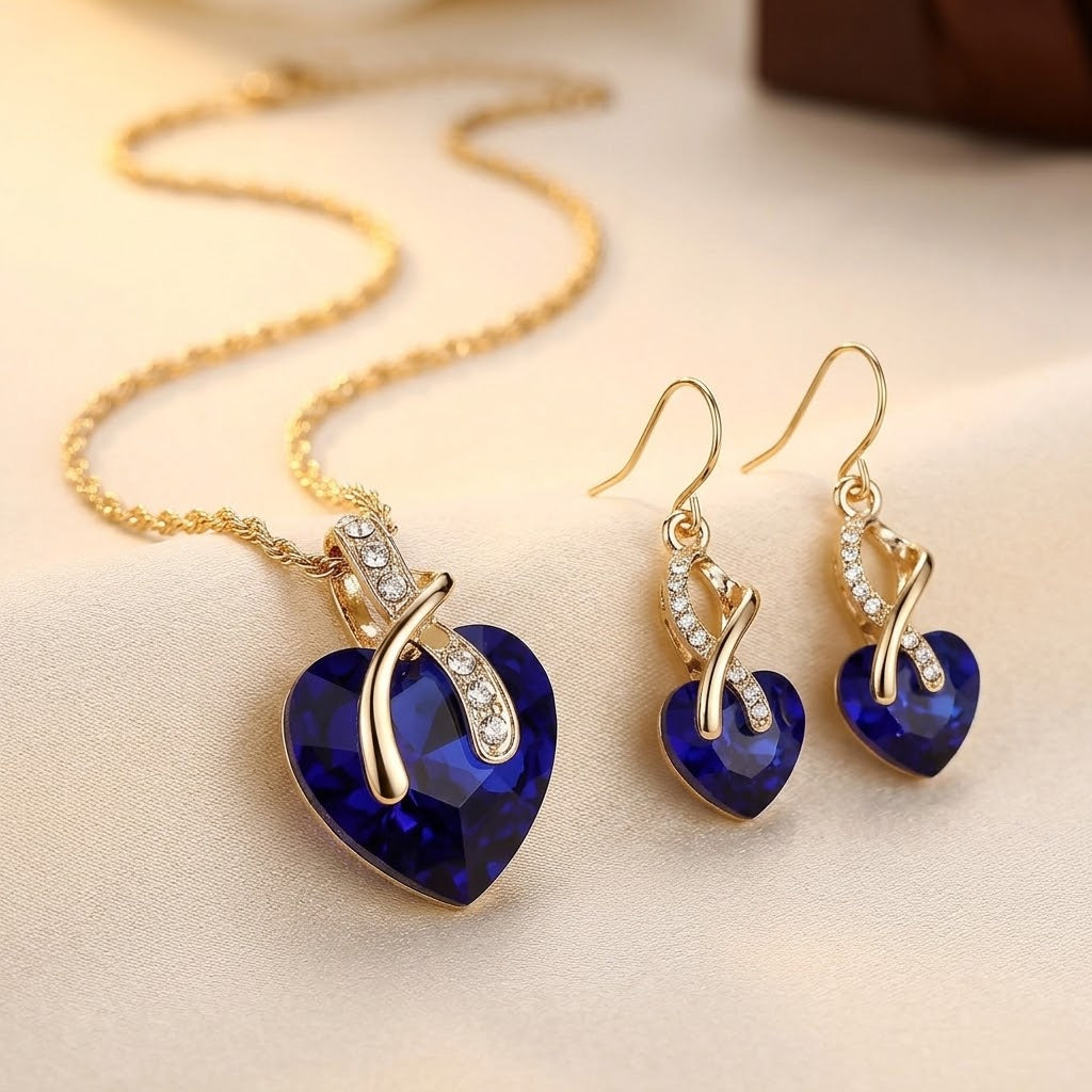 Ensemble collier et boucles d'oreilles cœur saphir en or