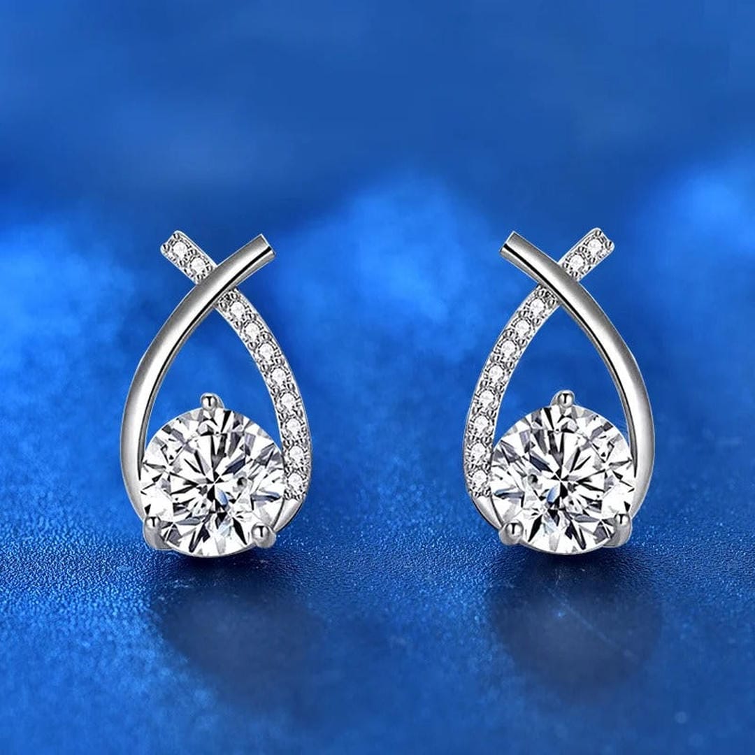 Boucles d’oreilles puces de luxe en forme de goutte torsadée avec zircone cubique