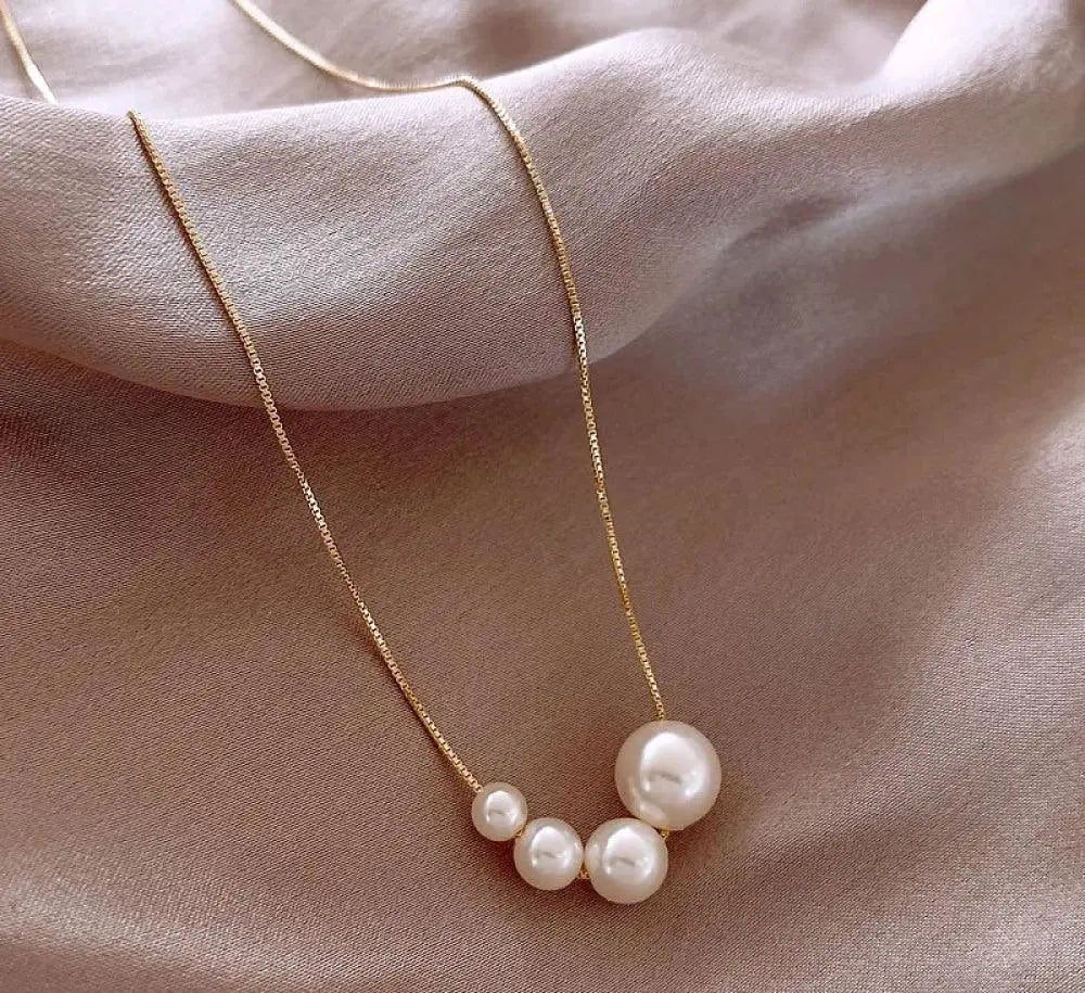 Collier élégant en or avec perles d’eau douce