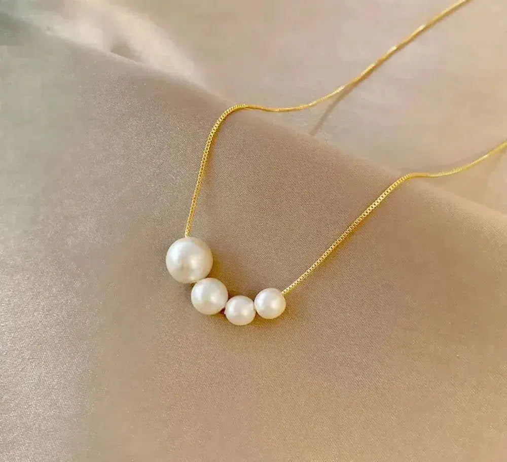 Collier élégant en or avec perles d’eau douce