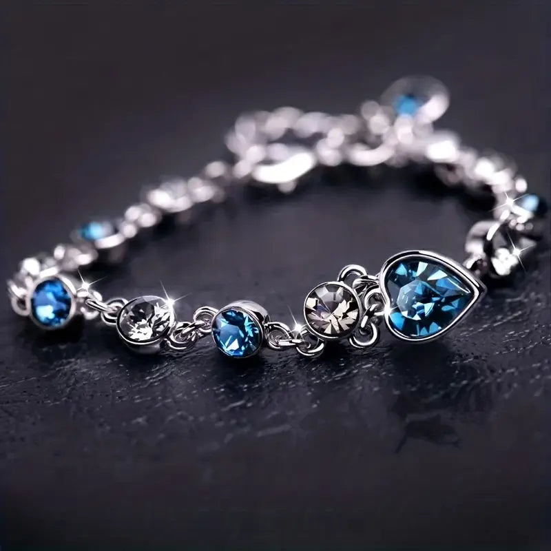 Bracelet chaîne en argent avec cœur en saphir