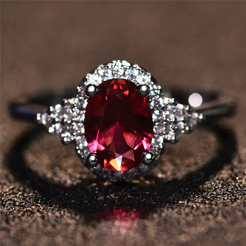 Bague halo en argent avec rubis