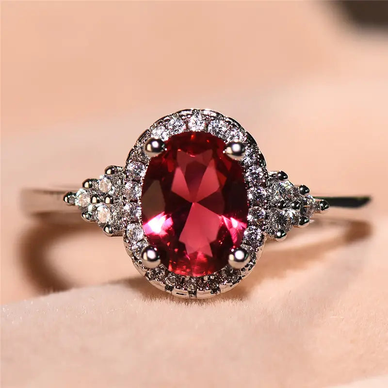 Bague halo en argent avec rubis