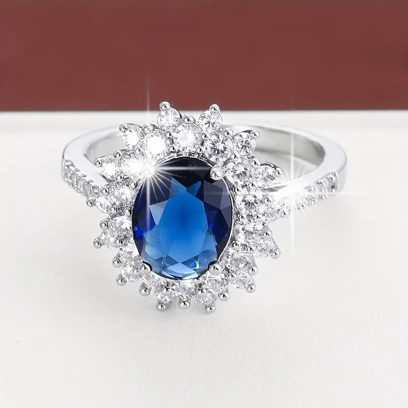 Bague halo en or avec saphir