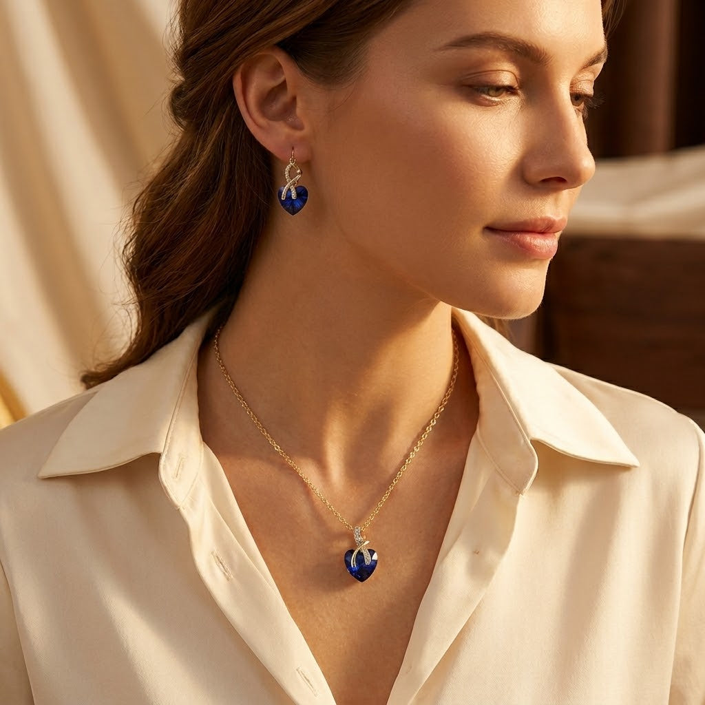 Ensemble collier et boucles d'oreilles cœur saphir en or