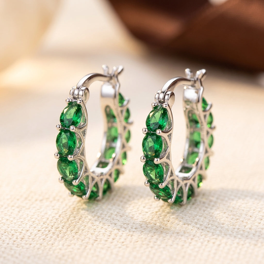 Boucles d'oreilles anneaux en treillis dorés émeraude