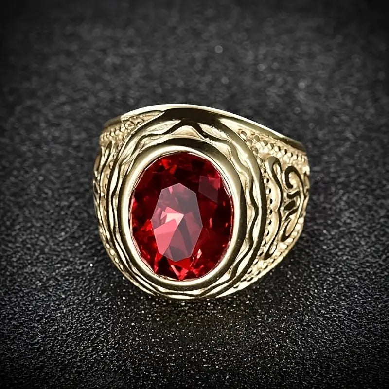 Bague gravée en or avec rubis