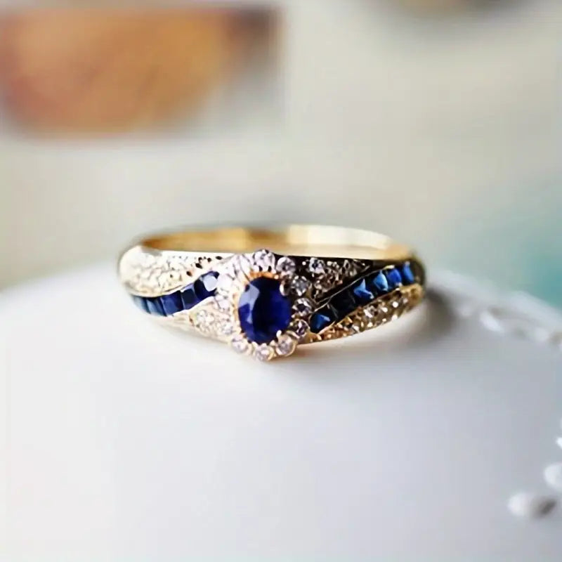 Bague alliance en or avec saphir