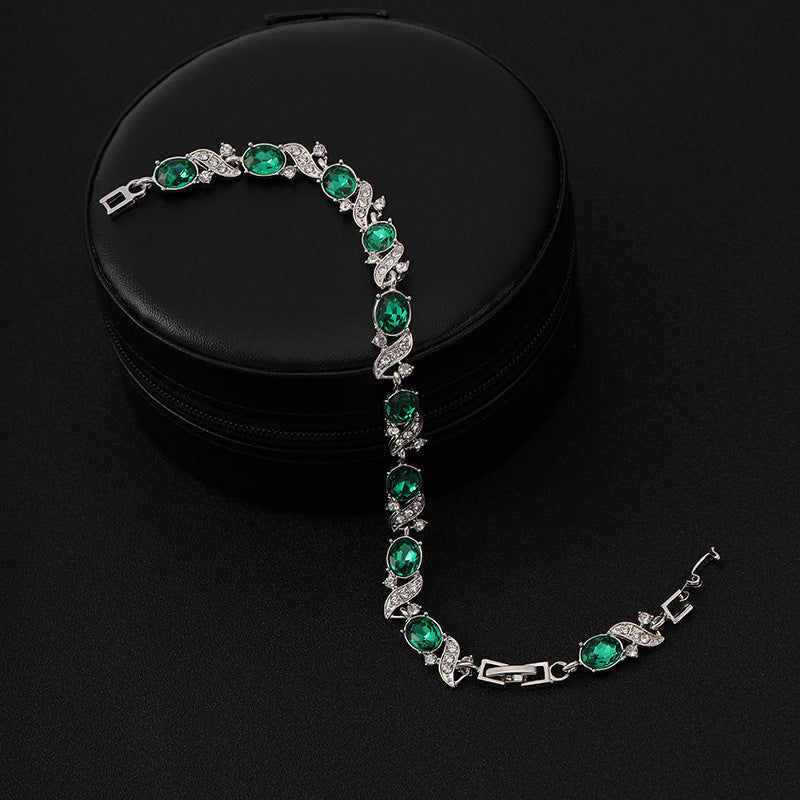 Bracelet à maillons vintage en argent avec émeraude