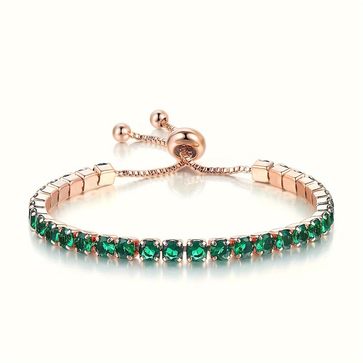 Bracelet tennis ajustable en or avec émeraude