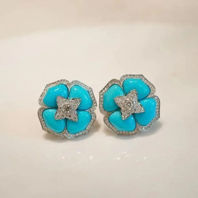 Boucles d'oreilles fleur turquoise intimes