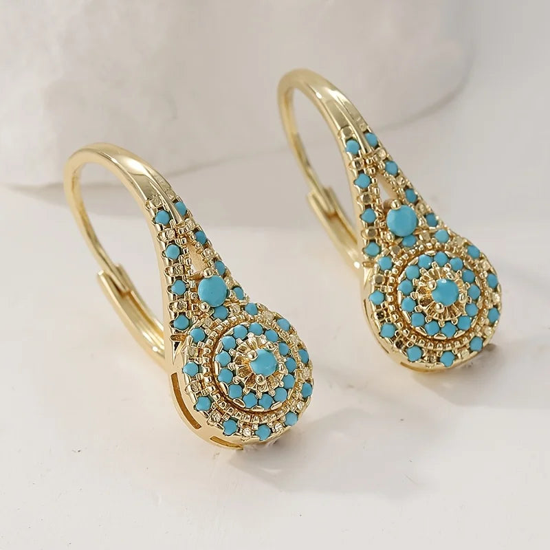 Boucles d'oreilles fleur turquoise dorée