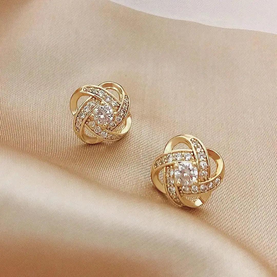 Boucles d’oreilles puces nœud en zircon