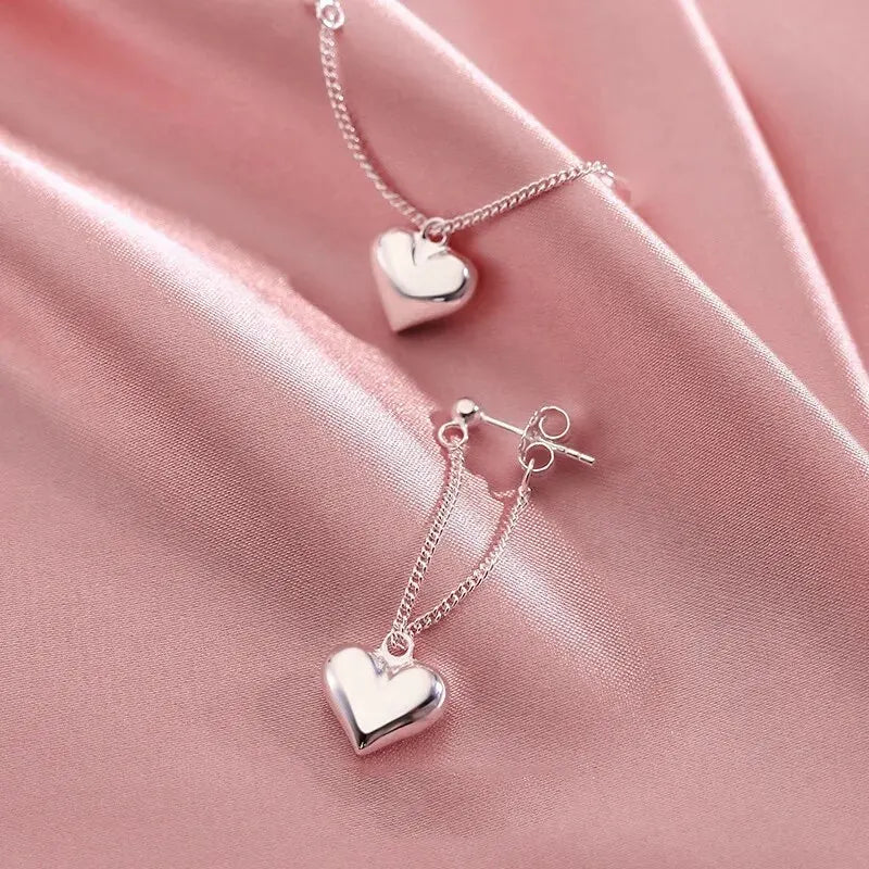 Boucles d’oreilles créoles géométriques en forme de cœur d’inspiration antique