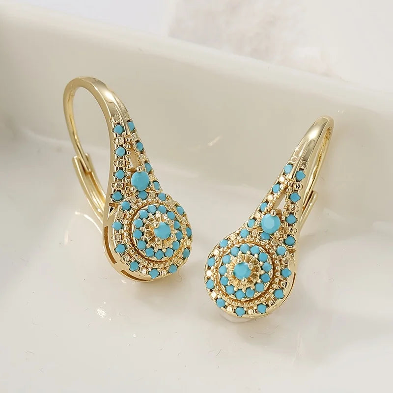 Boucles d'oreilles fleur turquoise dorée