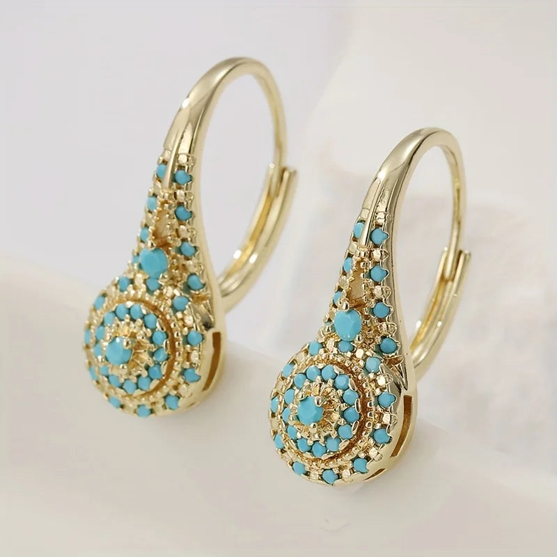 Boucles d'oreilles fleur turquoise dorée