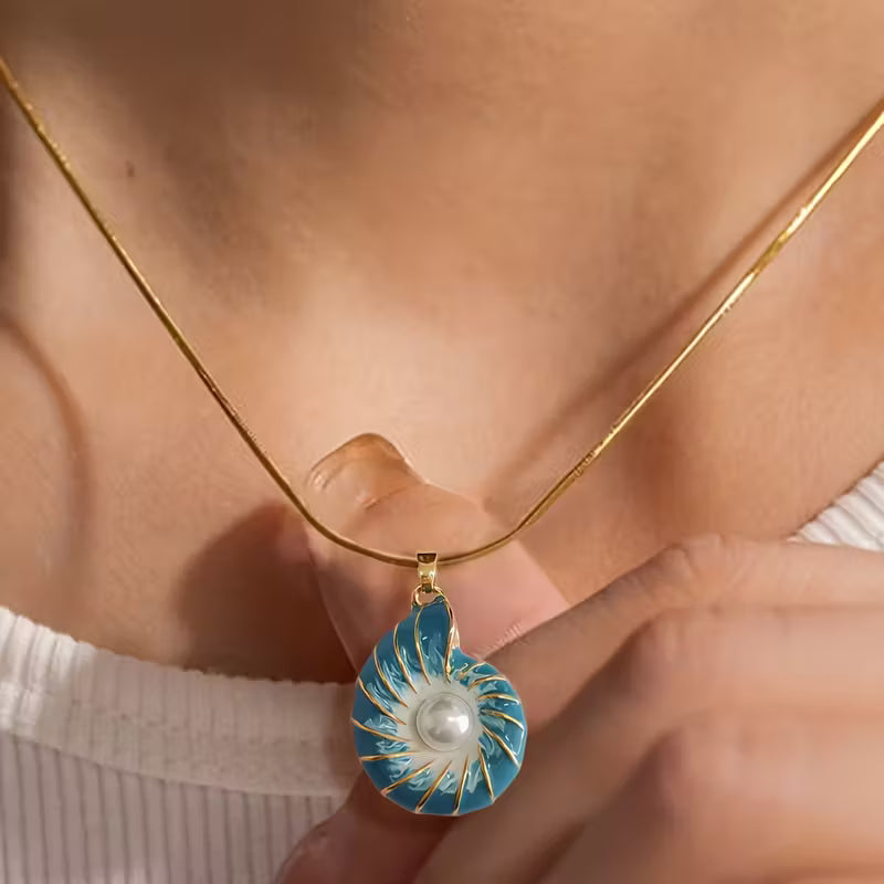 Collier coquillage perle doré