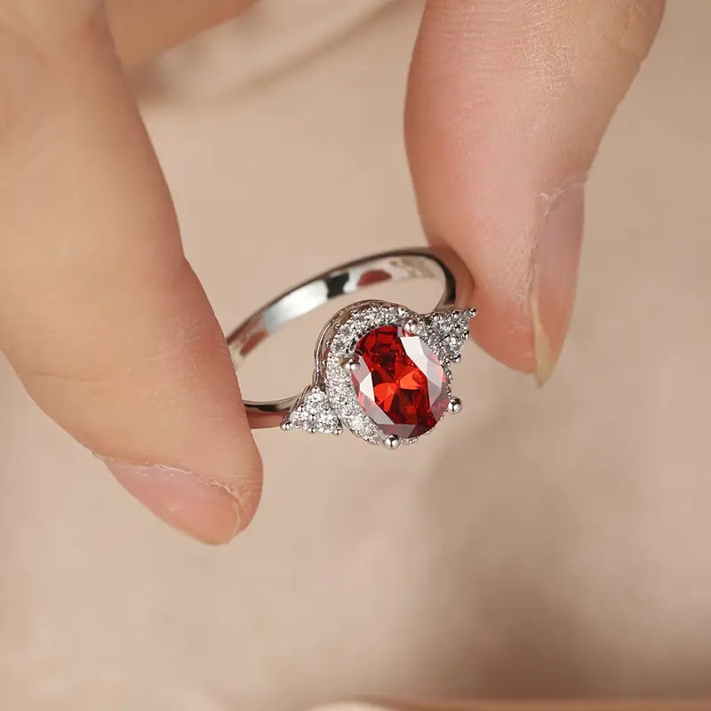 Bague halo en argent avec rubis