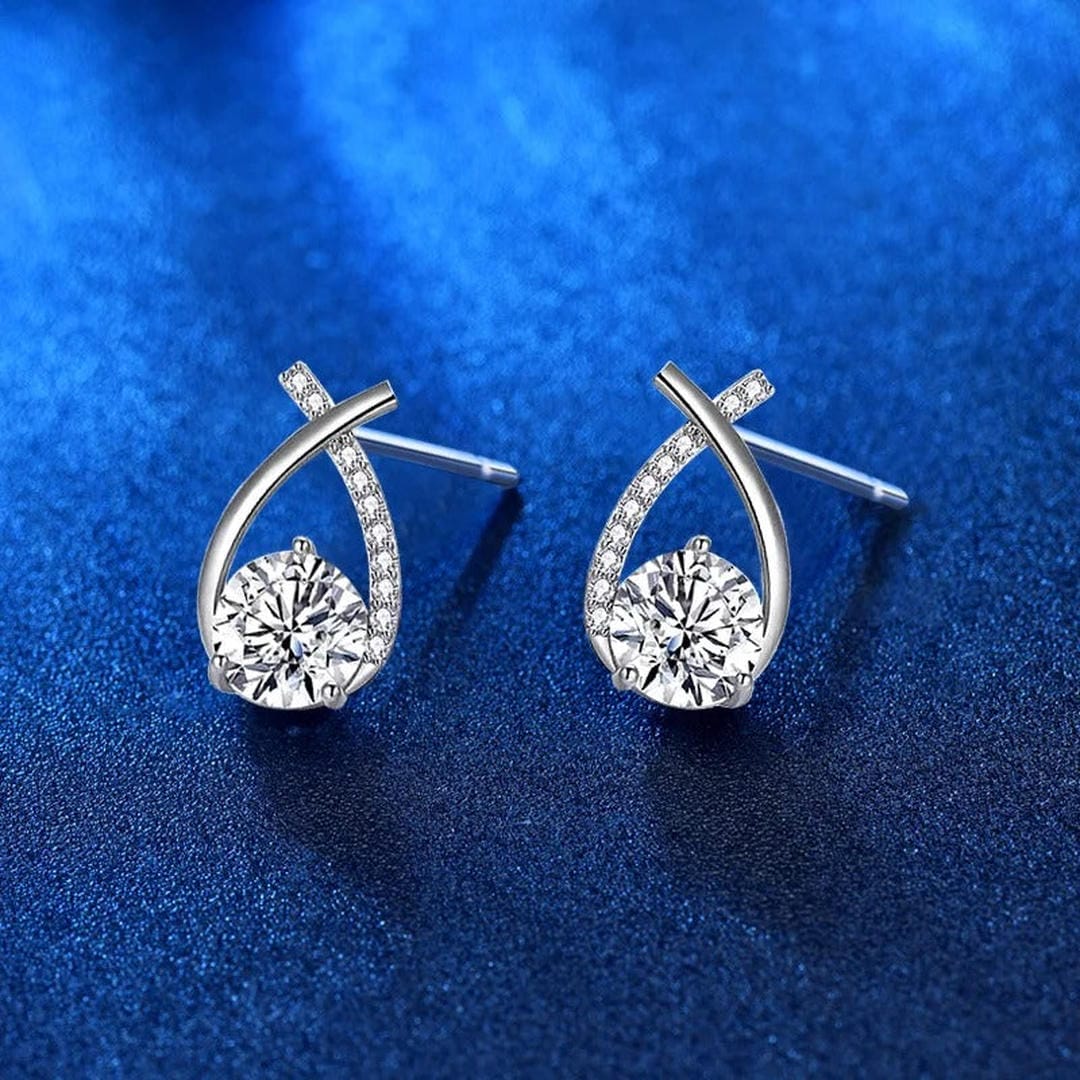 Boucles d’oreilles puces de luxe en forme de goutte torsadée avec zircone cubique