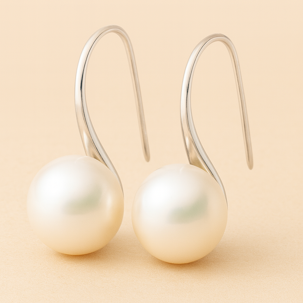 Boucles d’oreilles pendantes élégantes avec perles