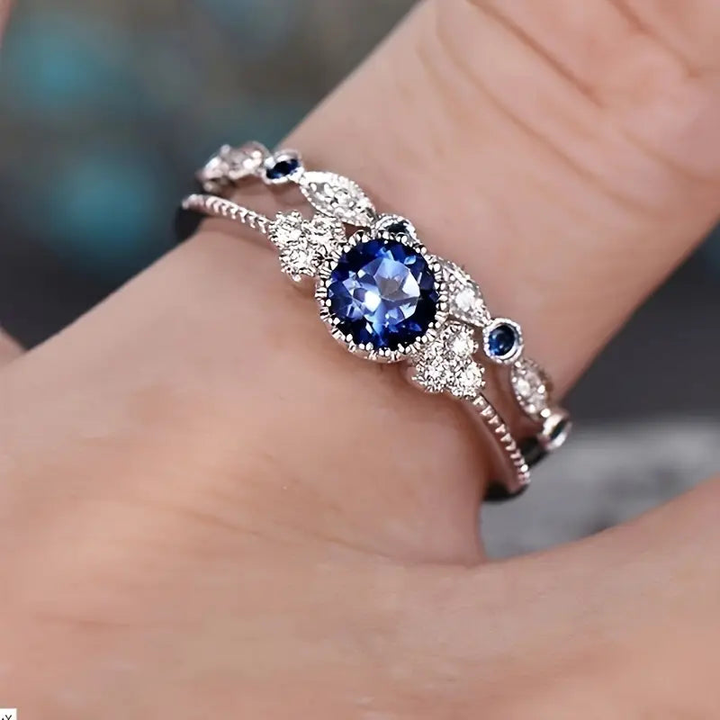 Bague halo en argent avec saphir