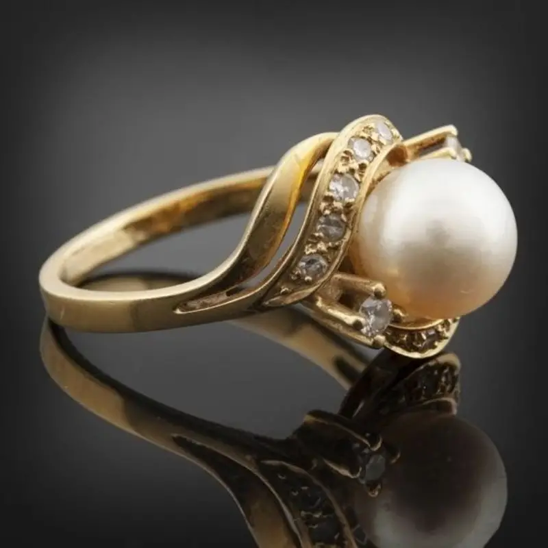 Bague chic avec perle et or radiant