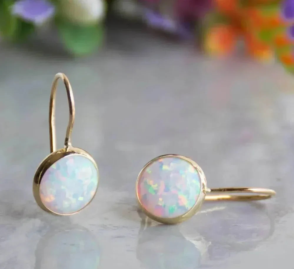 Boucles d’oreilles vintage dorées avec opale